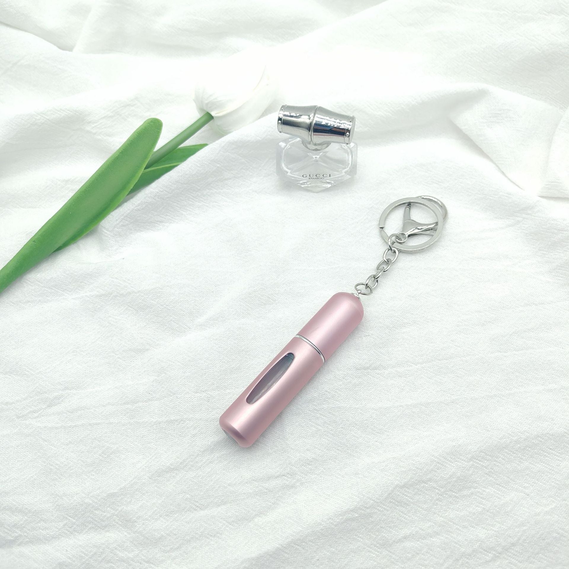Wholesale bottom filling pump 5ml high color value sample key chain perfume bottle